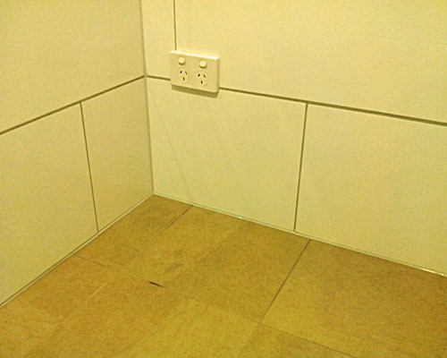 Floor tile caulking .