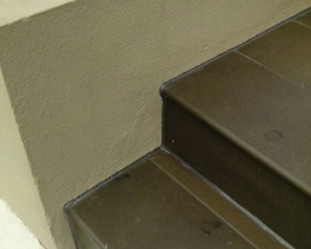 Caulking paved steps .
