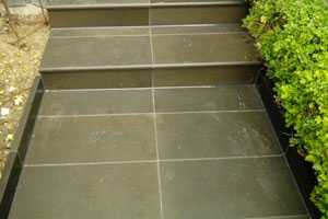 Caulking on an external paved pathway.