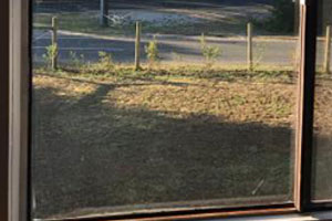Glass panel replaced within aluminium frame